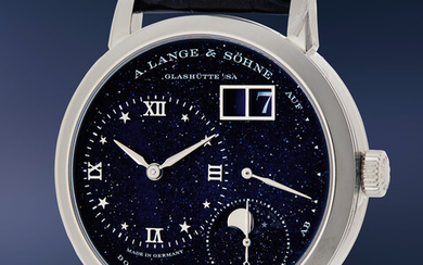 A. Lange & Söhne, Ref. 182.086 A fine and attractive white gold wristwatch with dark-blue gold flux dial, oversized date, moon phase, power reserve, guarantee, and presentation box