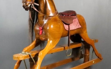 A Large Modern Walnut Rocking Horse, by Stevenson Brothers,...