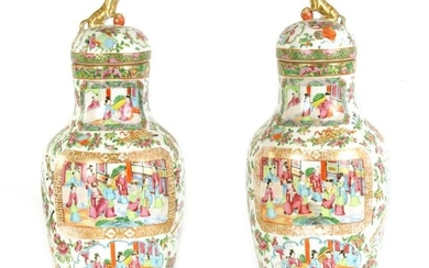 A PAIR OF 19TH CENTURY CANTON OVOID VASES WITH DOME