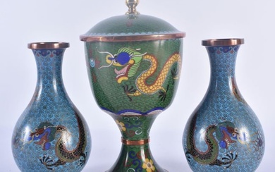 A PAIR OF 19TH CENTURY CHINESE CLOISONNE ENAMEL DRAGON VASES together with a later vase and cover. L