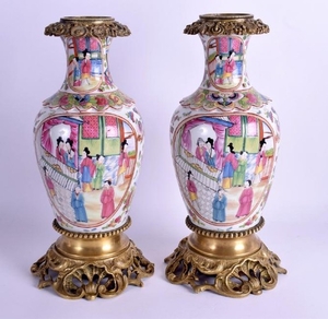 A PAIR OF 19TH CENTURY CHINESE FAMILLE ROSE VASES