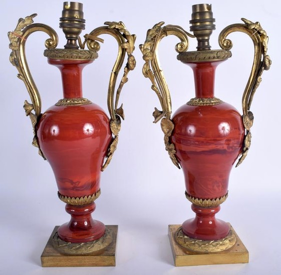 A PAIR OF MID 19TH CENTURY FRENCH TWIN HANDLED ORMOLU
