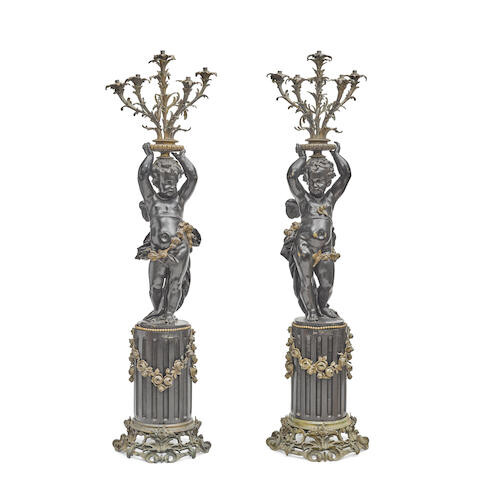 A Pair Of Monumental French Parcel Gilt and Patinated Bronze Figural Six Light Torcheres