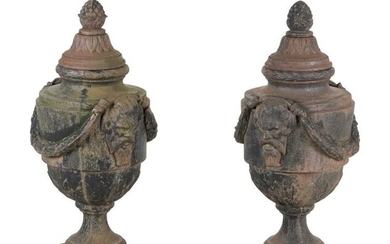 A Pair of Cast Iron Covered Garden Urns