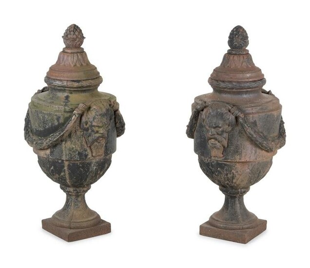 A Pair of Cast Iron Covered Garden Urns