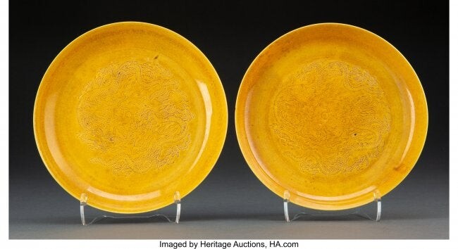 A Pair of Chinese Yellow Glazed Dragon Plates, Q