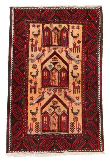 A Persian Beloutch rug, classic design with alcoves and animals on light base. 20th century. 186×116 cm.