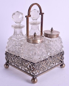 A SOLID SILVER CRUET SET, formed with a reticulated