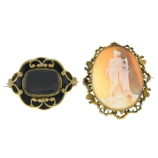 A Victorian black enamel hairwork mourning brooch, together with a shell cameo brooch.