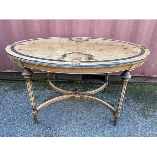 A Victorian inlaid walnut centre table with a banded and mar...