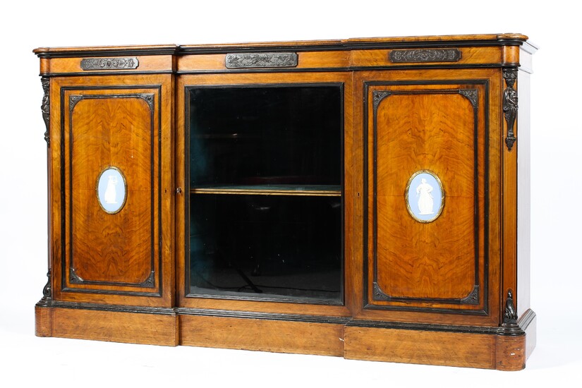 A Victorian walnut veneered side cabinet in the manner of Lamb of Manchester