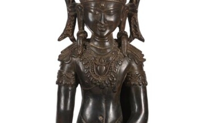 A bronze figure of the crowned Buddha