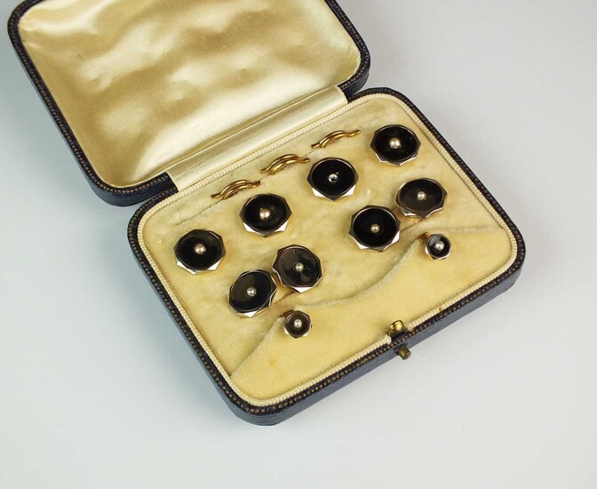 A cased set of split seed pearl set dress studs and cufflinks
