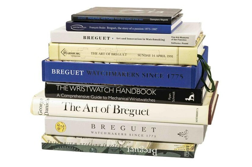 A collection books and catalogues on watches