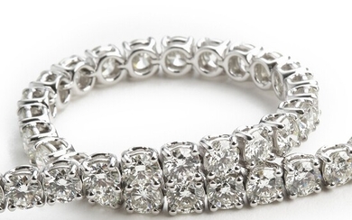 NOT SOLD. A diamond bracelet set with numerous brilliant-cut diamonds weighing app. 10.28 ct., mounted...
