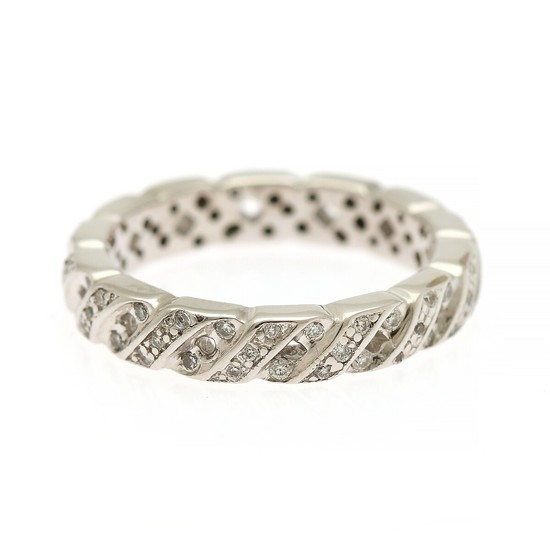 A diamond ring set with numerous brilliant-cut diamonds, mounted in 14k white gold. W. 4 mm. Size 54.