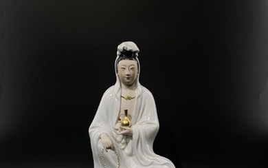 A fine large Chinese porcelain Guanyin figurine.