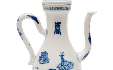 A large blue and white wine pitcher with cover