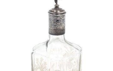 A late 19th/early 20th century German silver mounted vanity bottle, with pseudo Hanau marks for Karl Kurz, Kesselstadt, and import marks for London, 1905, Theodor Hartmann (agent for Karl Kurz), the squared glass bottle to silver collar and...