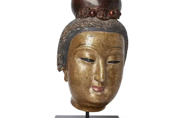A massive Chinese gilt lacquered stucco head of a Bodhisattva Late Ming...