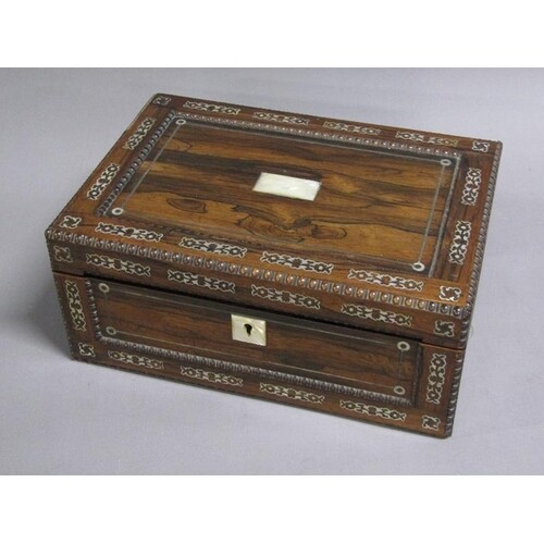 A mid 19c rosewood mother of pearl inlaid writing slope with...