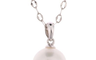 A modern 14ct white gold whole pearl and diamond pendant nec...