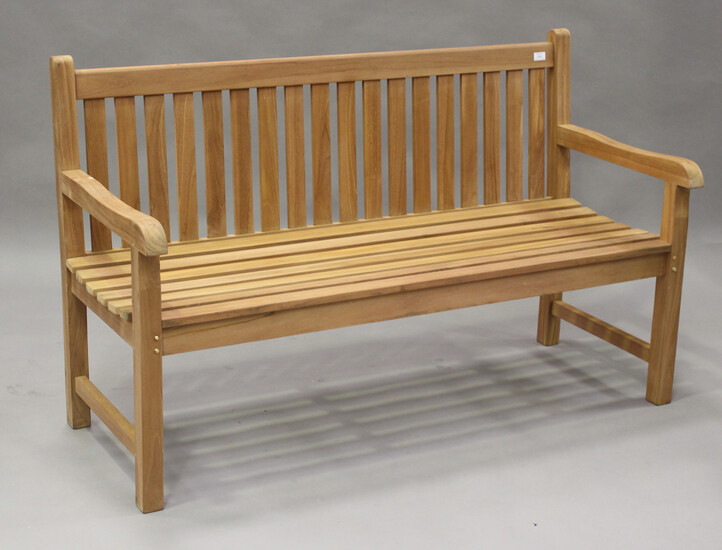 A modern hardwood slatted garden bench, height 93cm, width 10cm, depth 65cm.