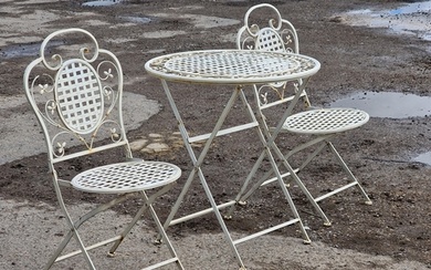 A painted metal three piece folding garden terrace set to in...