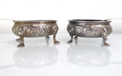 A pair of George II silver salts of oval form,...