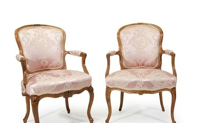 A pair of Louis XV carved beechwood fauteuils