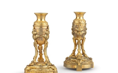 A pair of Louis XVI ormolu tripod candlesticks, late 18th century, probably North European | Paire de flambeaus tripodes Louis XVI en bronze doré, fin du XVIIIème siècle, probalement Nord Européen