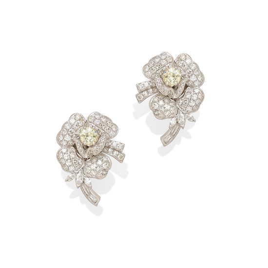 A pair of colored diamond and diamond ear clips