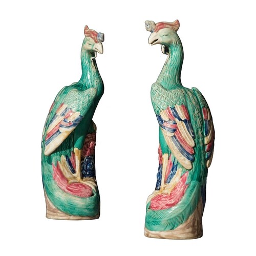 A pair of early 20th century Chinese green and polychrome gl...