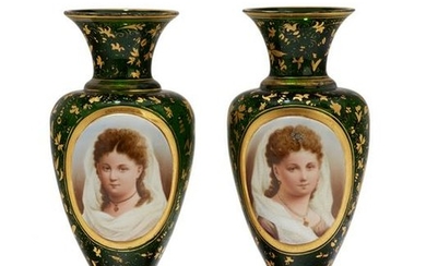A pair of green Bohemian glass portrait vases