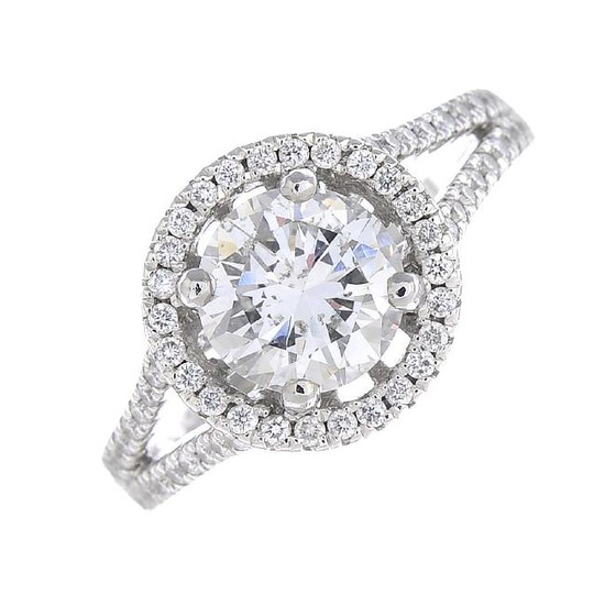 A platinum diamond cluster ring. The brilliant-cut
