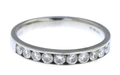 A platinum diamond half eternity ring.