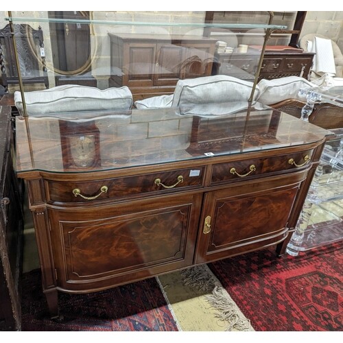 A reproduction Continental mahogany wash stand, width 130cm,...