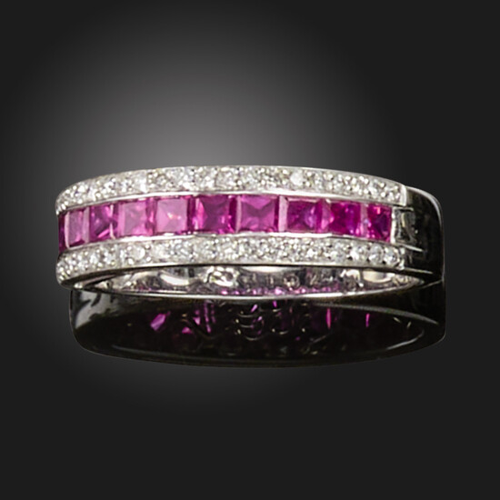 A ruby and diamond half-hoop ring