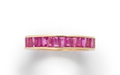 A ruby and fourteen karat gold ring