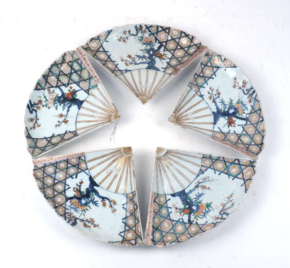 A set of five Japanese porcelain imari fan dishes, early 19th century, painted with flowering prunus blossom and peonies, 28cm wide (5)