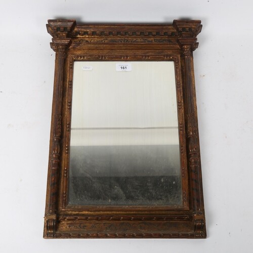 A small Regency gilded architectural framed rectangular wall...