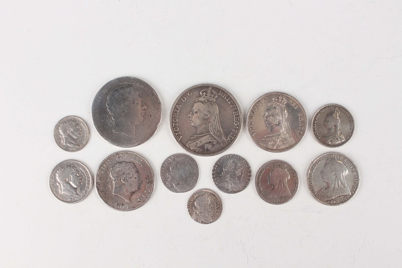 A small collection of 17th, 18th and 19th century milled silver coinage, including a Charles II four