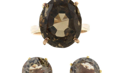 A smoky quartz single-stone ring, with matching earrings.