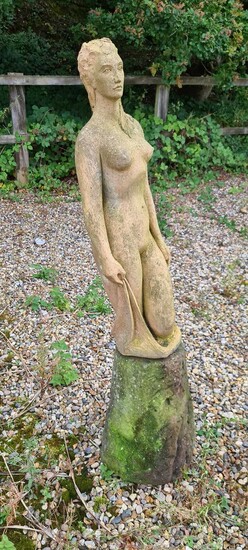 A terracotta garden figure of a nude woman