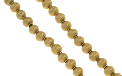 A textured bead necklace.