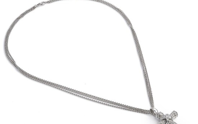 SOLD. A three-strand necklace of 14k white gold with a diamond cross with princess and brilliant-cut diamonds weighing app. 1.45 ct., mounted in 18k white gold. – Bruun Rasmussen Auctioneers of Fine Art