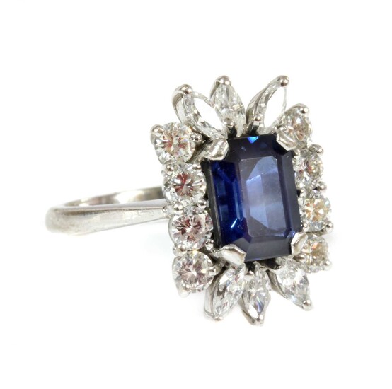 A white gold sapphire and diamond rectangular cluster ring