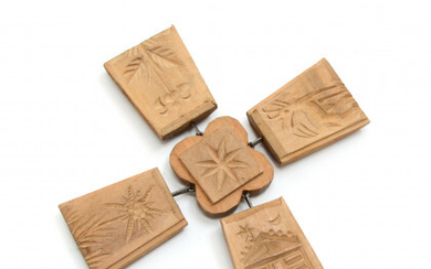 A wooden bread stamp