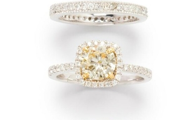 A yellow diamond, diamond white gold wedding ring set