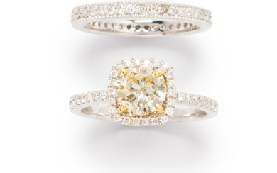 A yellow diamond, diamond white gold wedding ring set